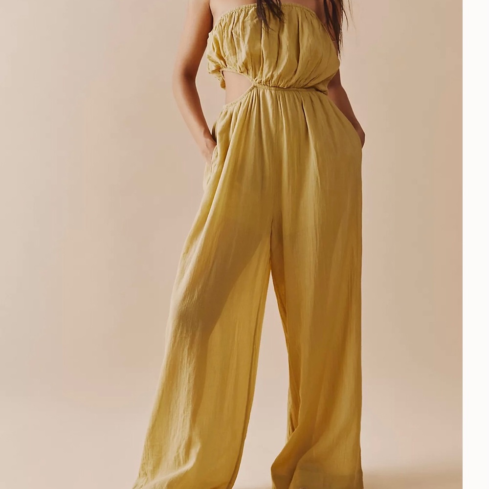 Free People jumper with cutout detailing at the bodice waistband size S